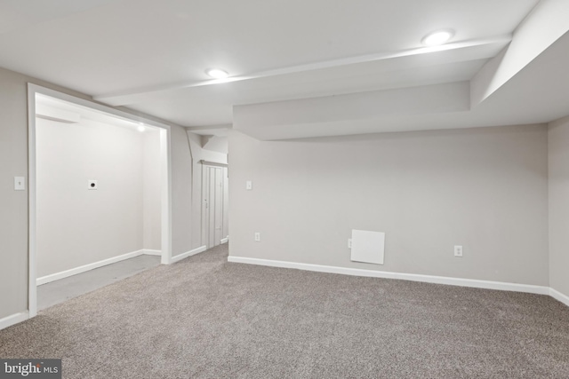 finished basement featuring carpet floors, recessed lighting, and baseboards