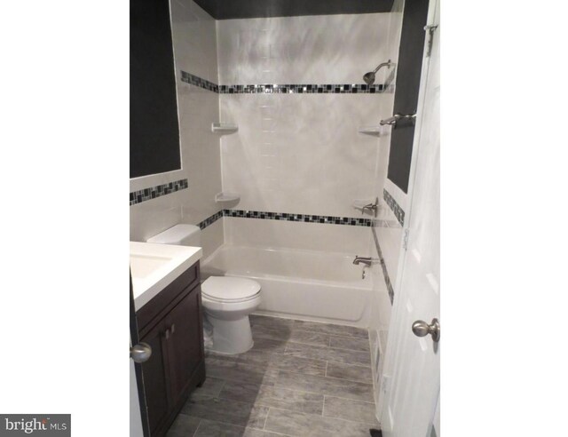 1918 Columbia Ave, Landover, MD 20785 - full bath with tile walls, toilet, bathing tub / shower combination, and vanity