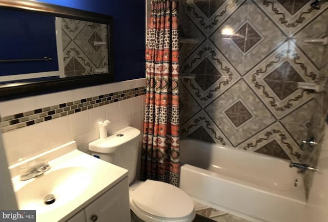 1918 Columbia Ave, Landover, MD 20785 - bathroom featuring tile walls, toilet, shower / bath combo with shower curtain, and vanity