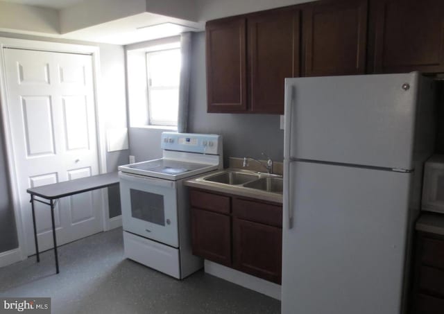 1918 Columbia Ave, Landover, MD 20785 - kitchen featuring white appliances, a sink, baseboards, and light countertops