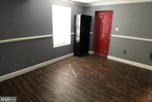 1918 Columbia Ave, Landover, MD 20785 - unfurnished room with baseboards, dark wood-style floors, and ornamental molding