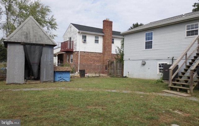 1918 Columbia Ave, Landover, MD 20785 - rear view of property featuring stairs, a shed, an outdoor structure, and a chimney
