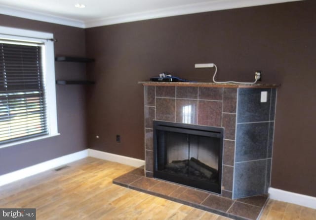 1918 Columbia Ave, Landover, MD 20785 - detailed view of wood finished floors, baseboards, ornamental molding, and a fireplace