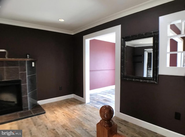 1918 Columbia Ave, Landover, MD 20785 - living room featuring crown molding, wood finished floors, baseboards, a fireplace, and recessed lighting