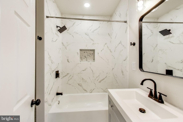 bathroom with vanity and shower / tub combination