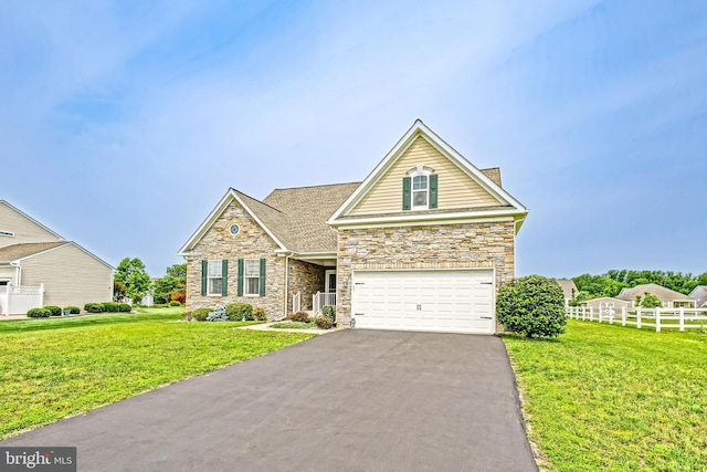24928 Rivers Edge Rd, Millsboro, DE 19966 - traditional-style home featuring stone siding, asphalt driveway, and an attached garage