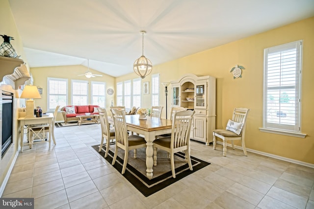24928 Rivers Edge Rd, Millsboro, DE 19966 - dining room featuring light tile patterned floors and vaulted ceiling