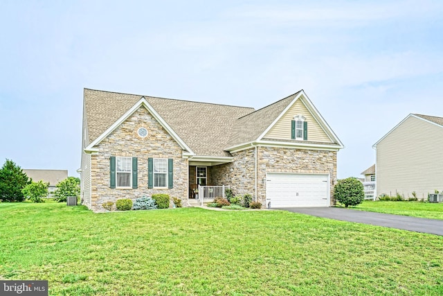 24928 Rivers Edge Rd, Millsboro, DE 19966 - craftsman house with stone siding, asphalt driveway, and a front yard
