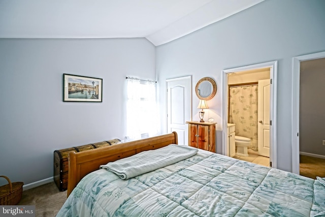 24928 Rivers Edge Rd, Millsboro, DE 19966 - carpeted bedroom featuring vaulted ceiling and ensuite bathroom