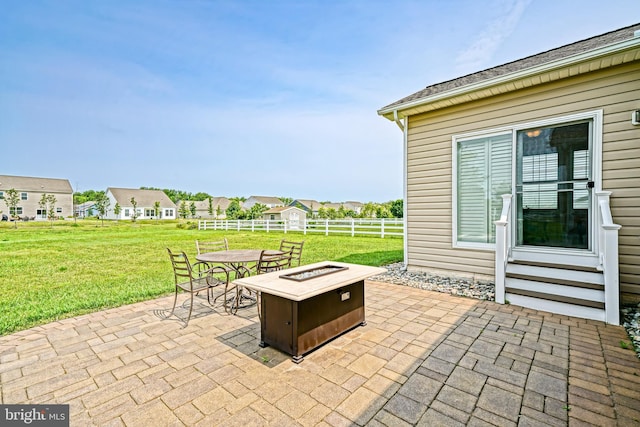 24928 Rivers Edge Rd, Millsboro, DE 19966 - view of patio / terrace with an outdoor fire pit, entry steps, and outdoor dining area