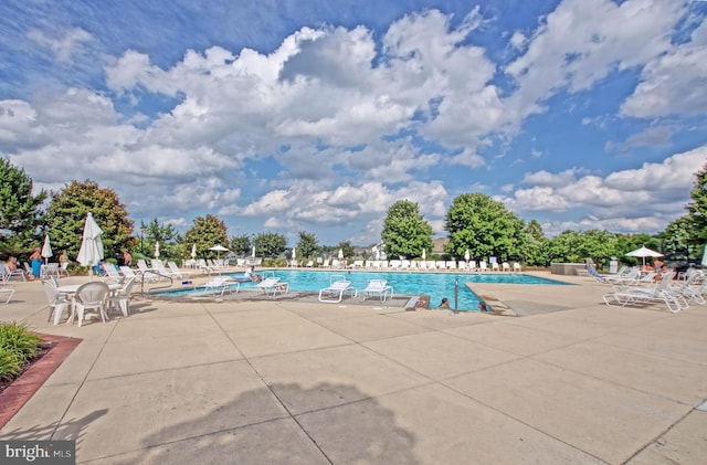 24928 Rivers Edge Rd, Millsboro, DE 19966 - community pool featuring a patio area