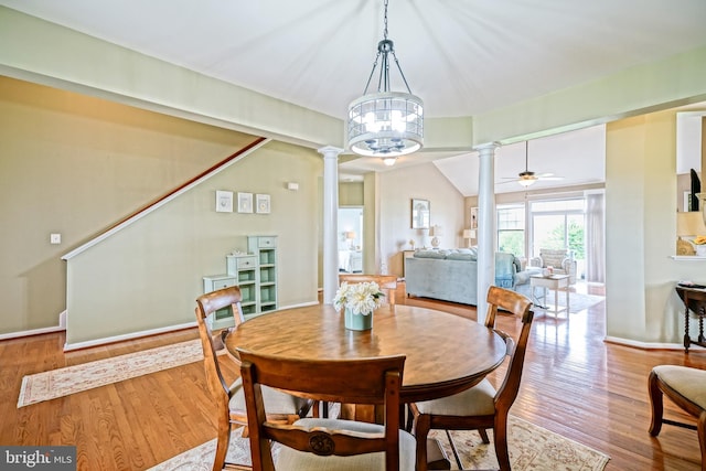 24928 Rivers Edge Rd, Millsboro, DE 19966 - dining space with ornate columns, wood finished floors, and a ceiling fan