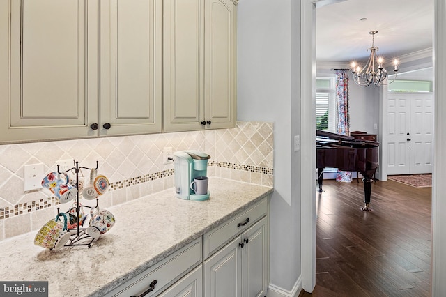 1760 Florence Rd, Mount Airy, MD 21771 - kitchen with cream cabinets, a chandelier, tasteful backsplash, and dark wood finished floors