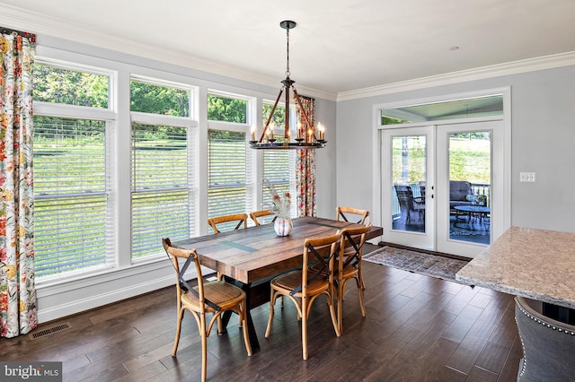 1760 Florence Rd, Mount Airy, MD 21771 - dining space with french doors, a chandelier, crown molding, dark wood-type flooring, and baseboards