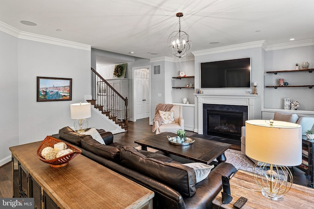 1760 Florence Rd, Mount Airy, MD 21771 - living room with dark wood-type flooring, stairs, crown molding, a fireplace with flush hearth, and a chandelier
