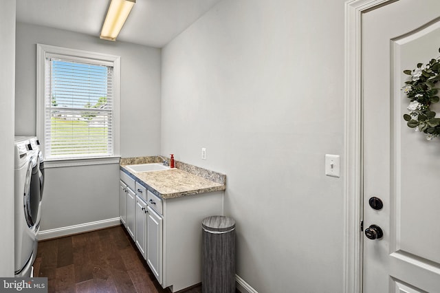 1760 Florence Rd, Mount Airy, MD 21771 - laundry area featuring washing machine and dryer, cabinet space, dark wood-style floors, and baseboards