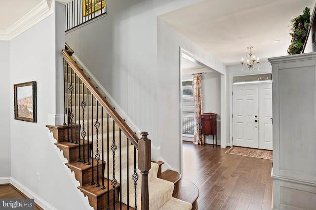 1760 Florence Rd, Mount Airy, MD 21771 - entrance foyer featuring dark wood finished floors, a chandelier, stairway, baseboards, and ornamental molding