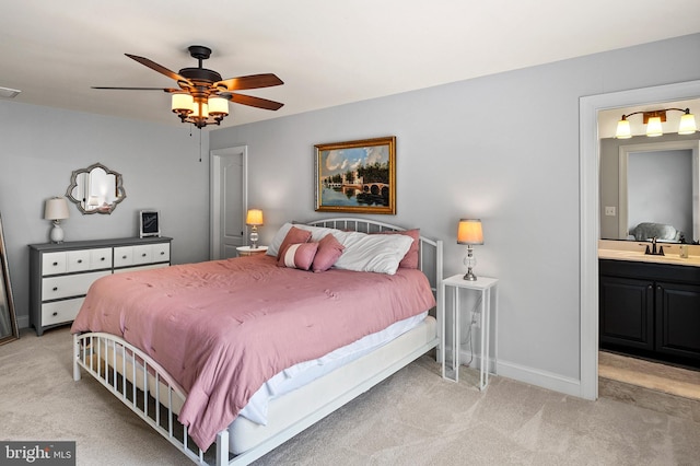 1760 Florence Rd, Mount Airy, MD 21771 - bedroom with light colored carpet, a sink, connected bathroom, and baseboards