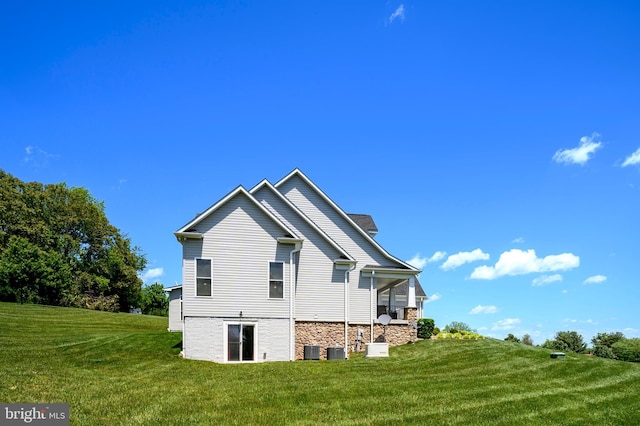 1760 Florence Rd, Mount Airy, MD 21771 - view of property exterior featuring a yard, cooling unit, and stone siding