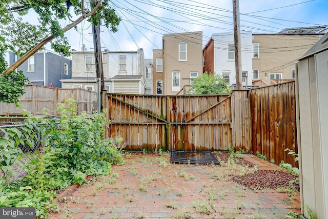 1307 Emerald St NE, Washington, DC 20002 - fenced backyard with a patio area