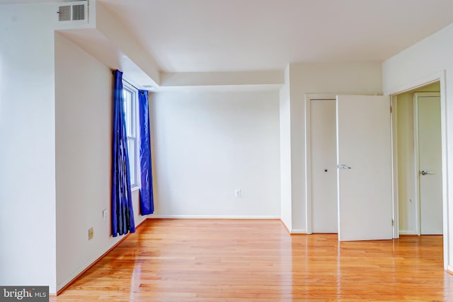 1307 Emerald St NE, Washington, DC 20002 - empty room featuring light wood-style flooring and baseboards