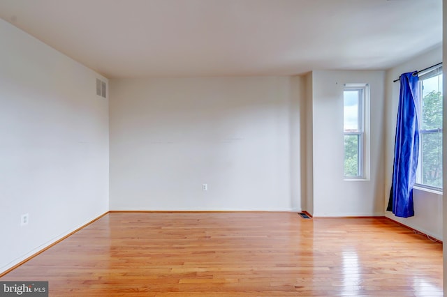 1307 Emerald St NE, Washington, DC 20002 - empty room with wood finished floors and baseboards