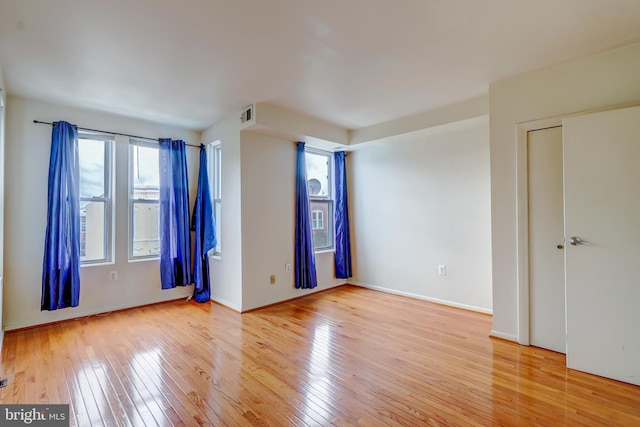 1307 Emerald St NE, Washington, DC 20002 - spare room featuring healthy amount of natural light, light wood finished floors, and baseboards