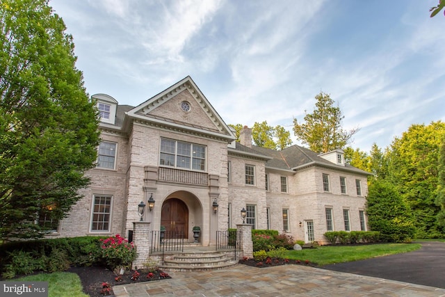 1034 Founders Ridge Ln, Mclean, VA 22102 - colonial home featuring brick siding and a chimney
