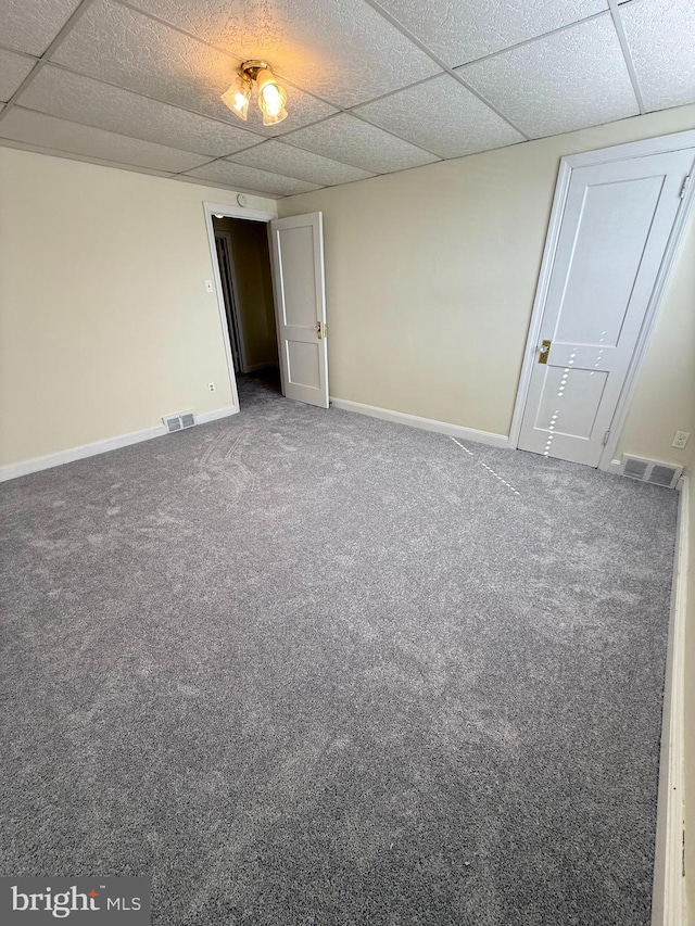 426 S Church St, Clifton Heights, PA 19018 - carpeted empty room with a paneled ceiling and baseboards
