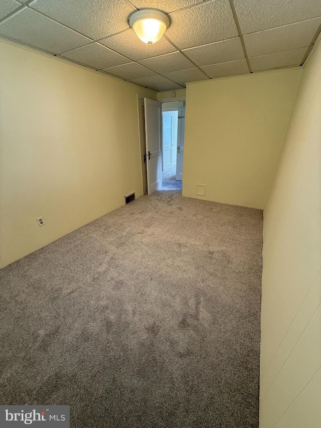 426 S Church St, Clifton Heights, PA 19018 - carpeted empty room with a drop ceiling