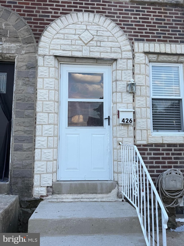 426 S Church St, Clifton Heights, PA 19018 - view of exterior entry featuring brick siding and stone siding