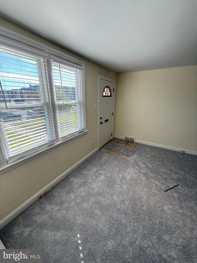 426 S Church St, Clifton Heights, PA 19018 - foyer entrance with carpet flooring and baseboards