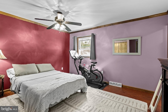 115 Bailey Settlement Hwy, Clearfield, PA 16830 - bedroom with crown molding, wood finished floors, a ceiling fan, and baseboards