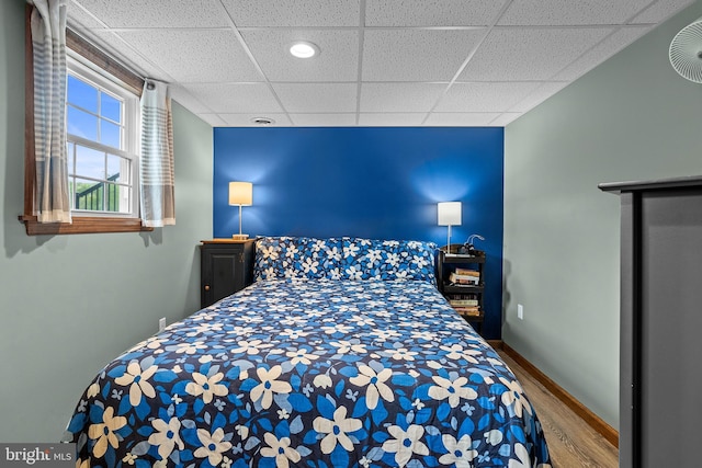 115 Bailey Settlement Hwy, Clearfield, PA 16830 - bedroom with wood finished floors, a paneled ceiling, and baseboards