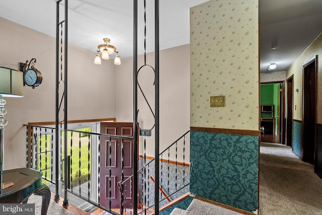 115 Bailey Settlement Hwy, Clearfield, PA 16830 - staircase with wallpapered walls and carpet flooring