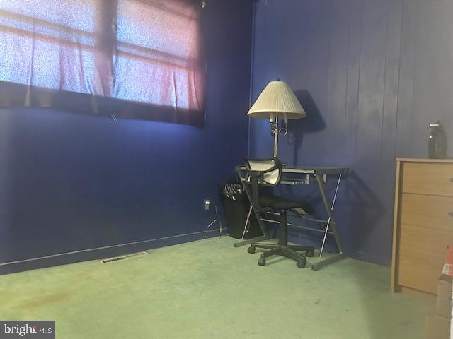 view of carpeted office space