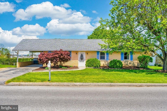 4115 Grandview Rd, Hanover, PA 17331 - ranch-style house with brick siding, an attached carport, driveway, and a front yard
