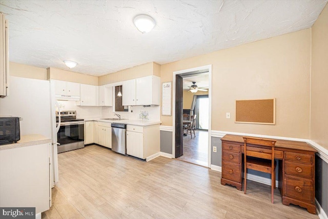 4115 Grandview Rd, Hanover, PA 17331 - kitchen with stainless steel appliances, light countertops, under cabinet range hood, and light wood finished floors