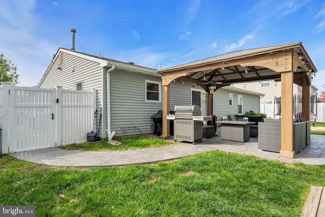 179 Ravenwood Blvd, Barnegat, NJ 08005 - rear view of house featuring an outdoor living space, a gazebo, a gate, and a patio area