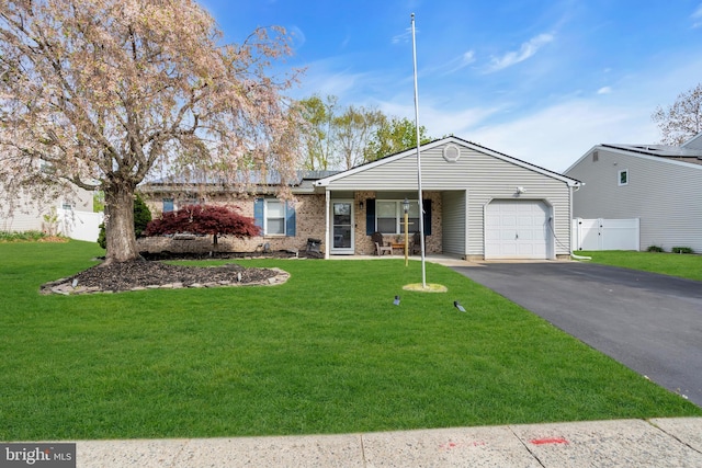 179 Ravenwood Blvd, Barnegat, NJ 08005 - ranch-style house featuring a garage, asphalt driveway, and brick siding