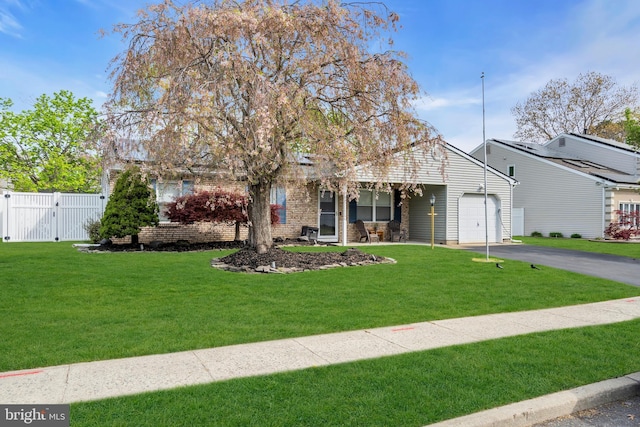 179 Ravenwood Blvd, Barnegat, NJ 08005 - view of front facade featuring a gate, an attached garage, driveway, and brick siding