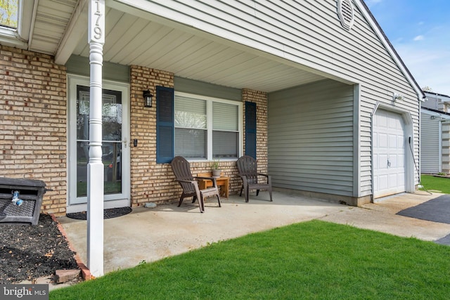 179 Ravenwood Blvd, Barnegat, NJ 08005 - view of patio with a garage and covered porch