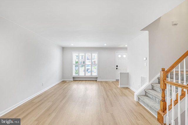 11554 Bertram St, Woodbridge, VA 22192 - foyer with light wood-type flooring, stairway, baseboards, and recessed lighting