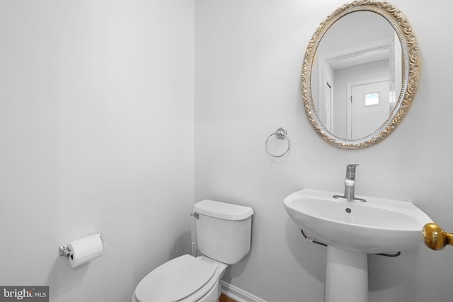 11554 Bertram St, Woodbridge, VA 22192 - bathroom with toilet and baseboards