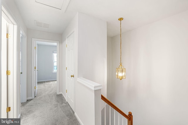 11554 Bertram St, Woodbridge, VA 22192 - hallway featuring an upstairs landing, carpet floors, and baseboards