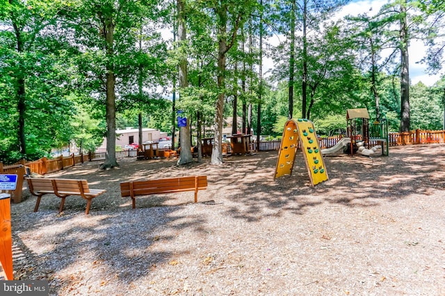 11554 Bertram St, Woodbridge, VA 22192 - community jungle gym featuring fence and view of scattered trees