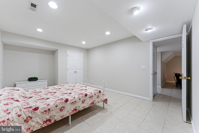 bedroom featuring recessed lighting and baseboards