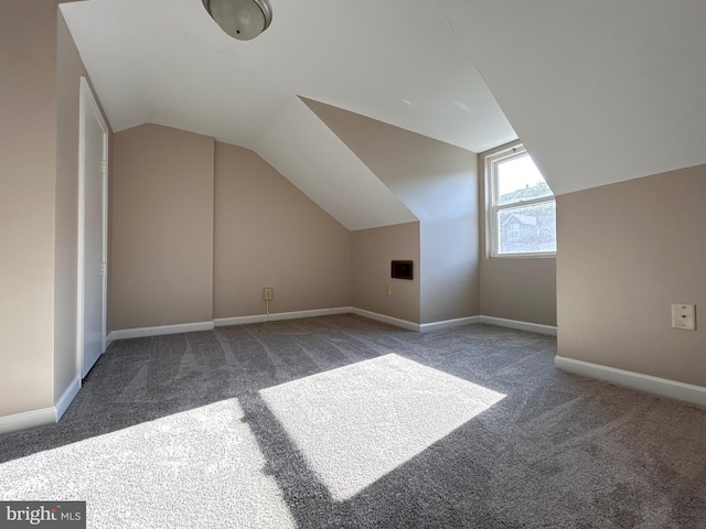 520 Birch St, Reading, PA 19604 - bonus room featuring carpet floors, lofted ceiling, and baseboards