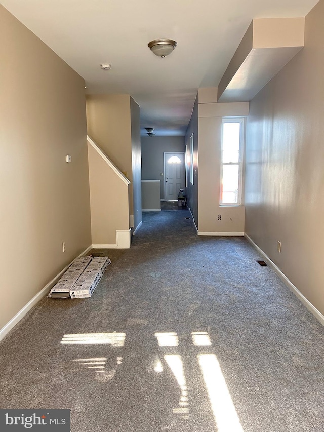 520 Birch St, Reading, PA 19604 - carpeted spare room featuring baseboards and a smoke detector
