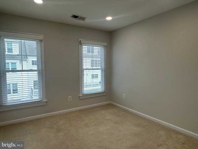 93 Heron Ln, Occoquan, VA 22125 - empty room featuring light colored carpet, baseboards, and recessed lighting